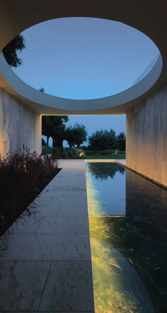 Villa Jay-Tona illuminated pool corridor with oculus skylight